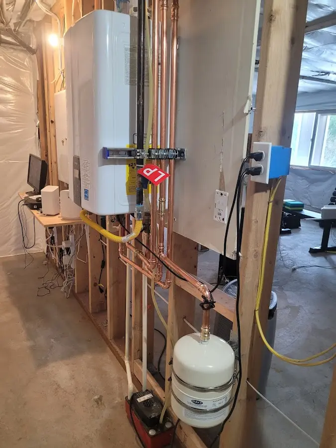 Licensed plumber repairing a kitchen sink in Ottawa