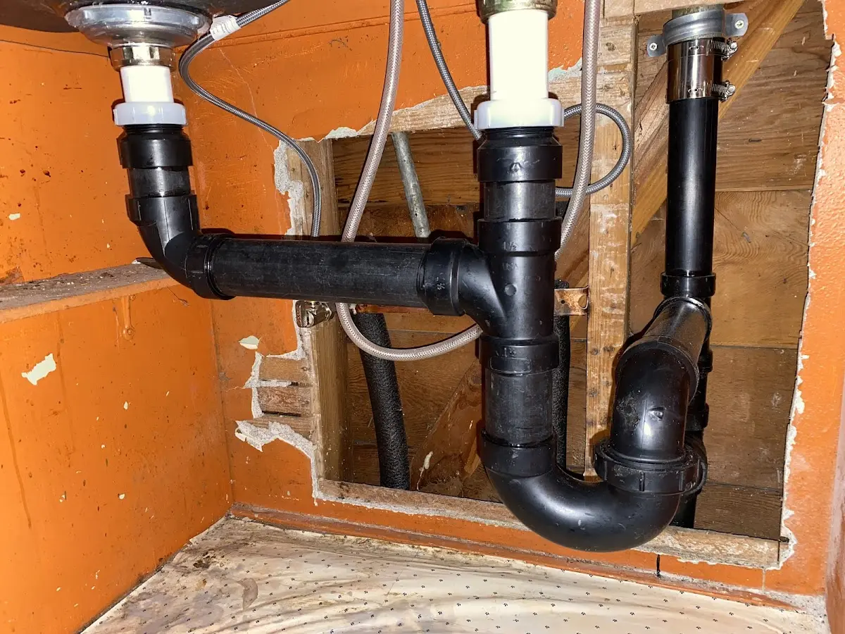 Professional Garbage Disposal Repair equipment and tools on the job in Ottawa